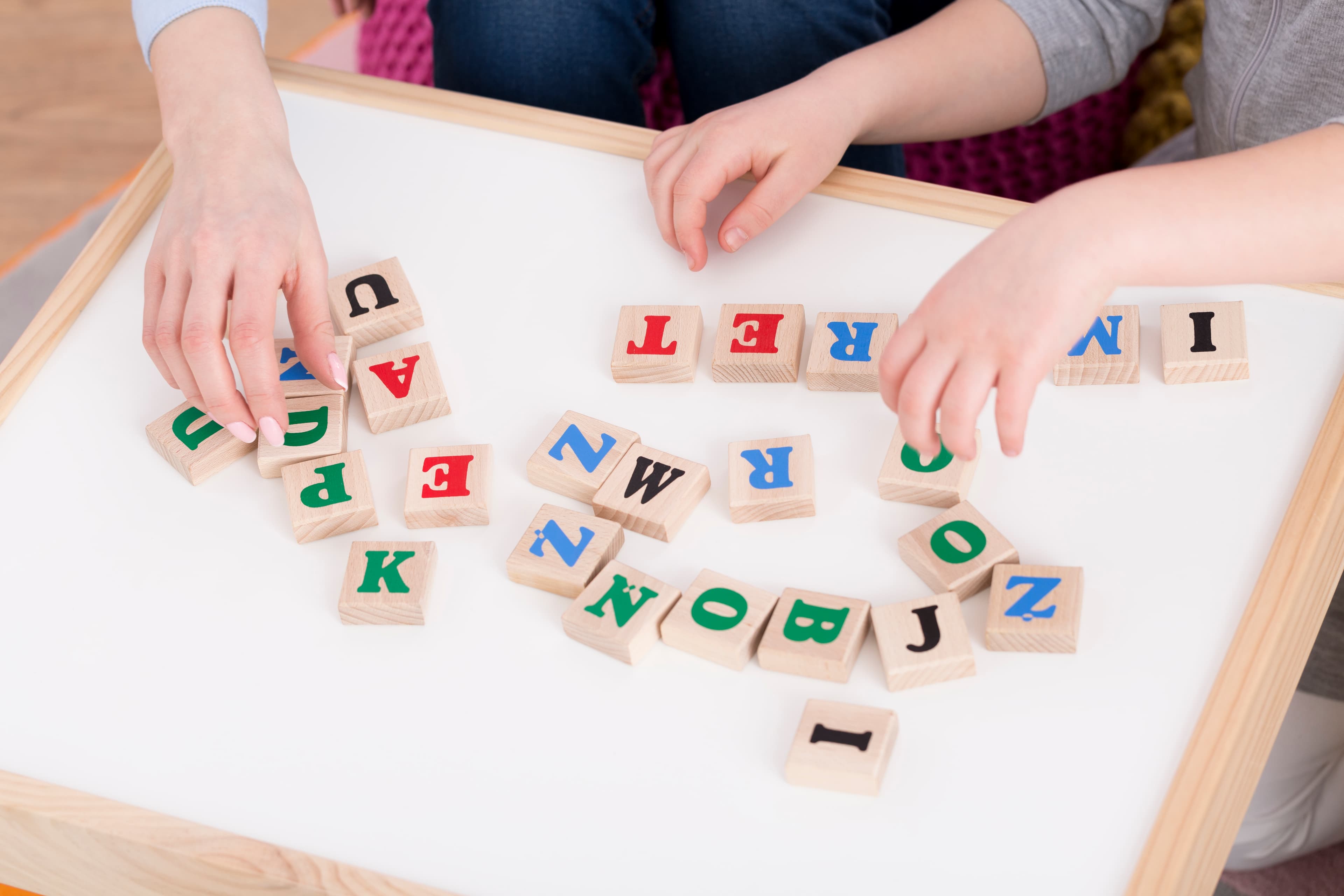 Child practicing reading and writing skills