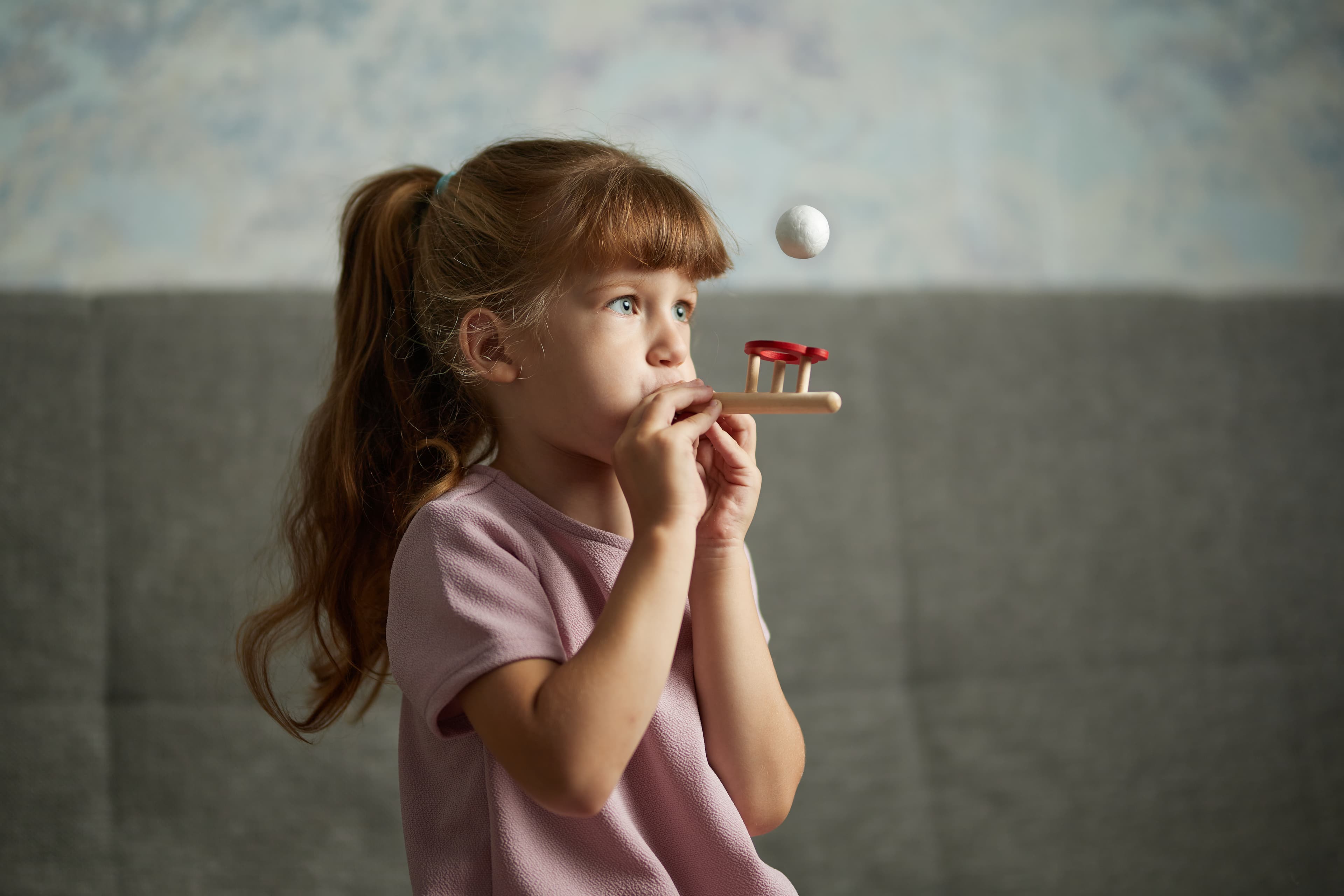 Child receiving orofacial myology therapy