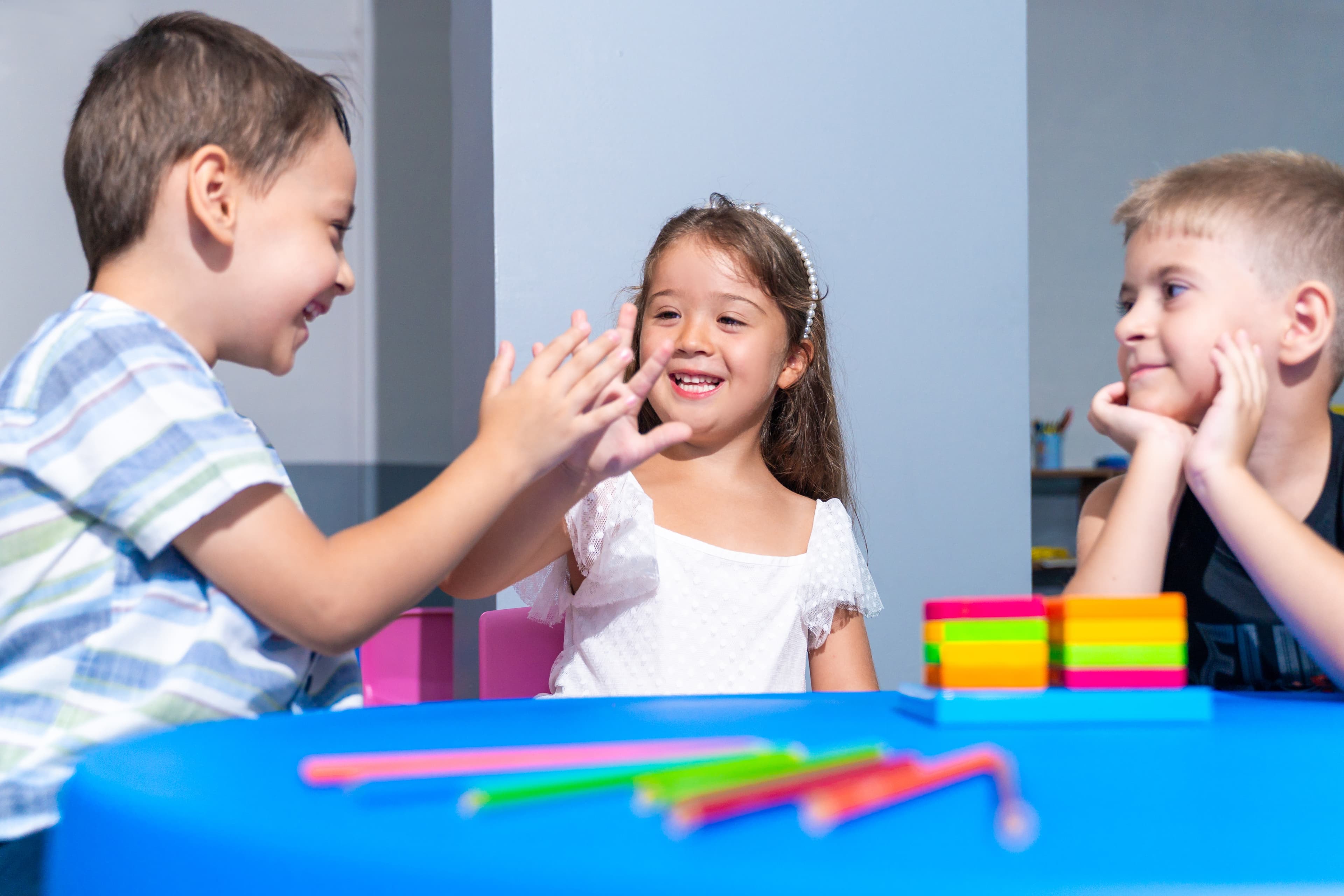 Children engaging in social interaction activities